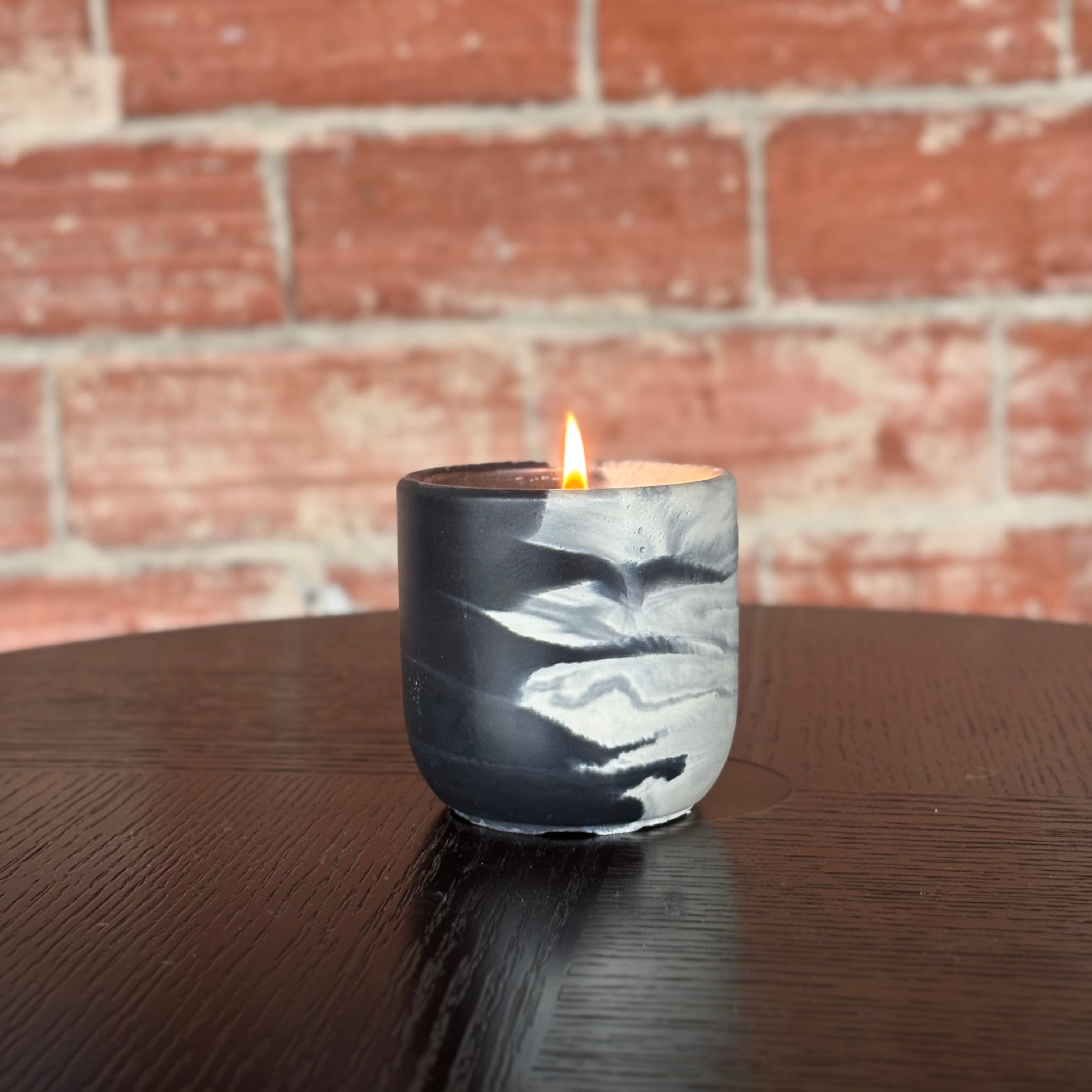 Amber Iris Candle in Handcrafted Black & White Marble Cement Vessel